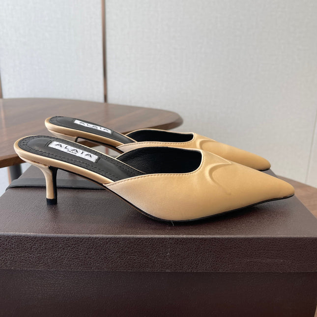 ALAIA 26S HEELED MULES 50 MM IN WARM BEIGE FABRIC