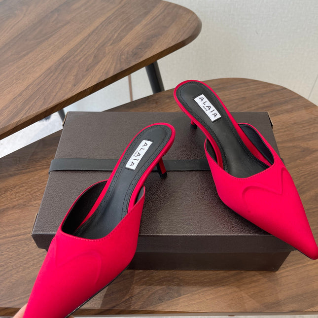 ALAIA 26S HEELED MULES 50 MM IN RED FABRIC