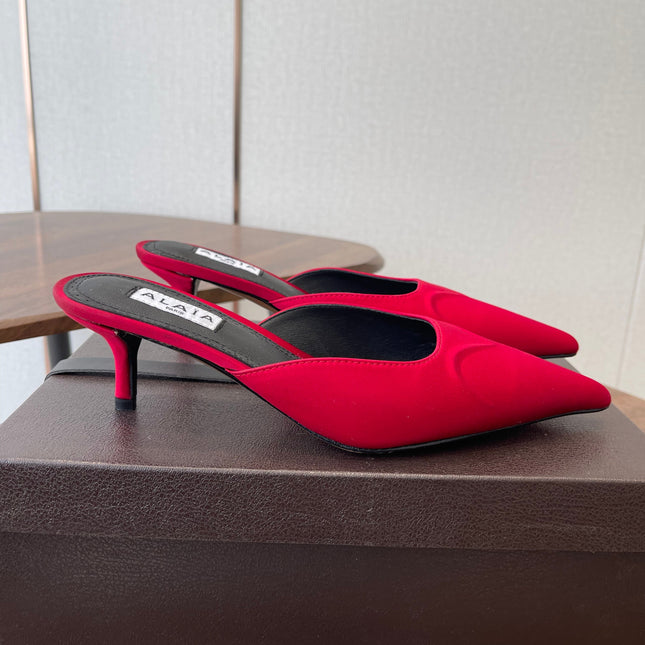 ALAIA 26S HEELED MULES 50 MM IN RED FABRIC
