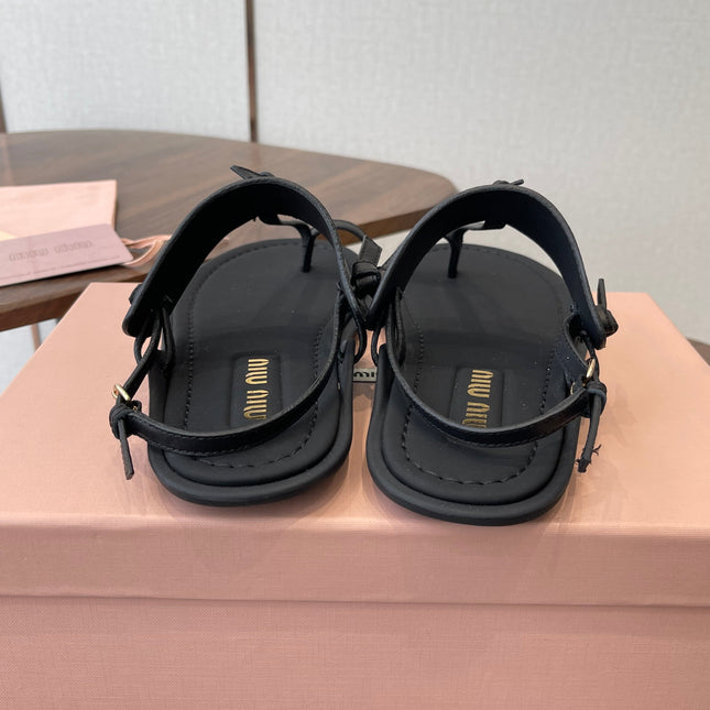 MIUMIU 26S FLIP FLOPS IN BLACK CALFSKIN