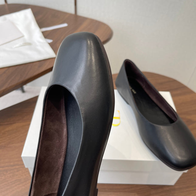 THE ROW 26S FLATS IN BLACK CALFSKIN