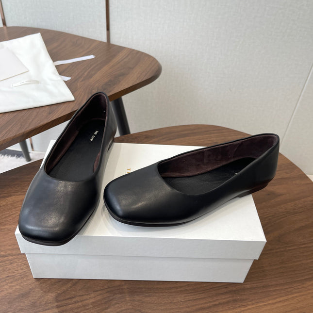 THE ROW 26S FLATS IN BLACK CALFSKIN