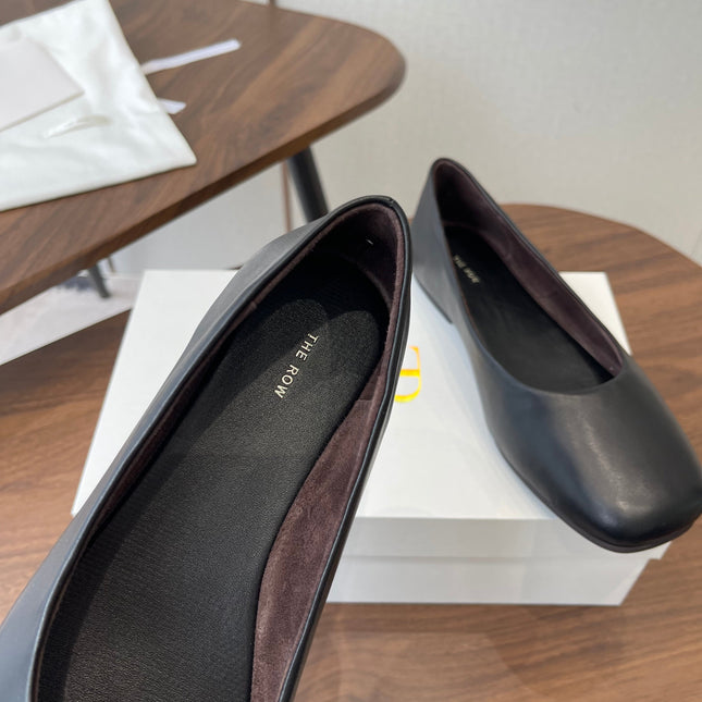 THE ROW 26S FLATS IN BLACK CALFSKIN