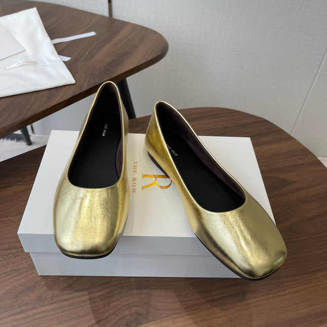 THE ROW 26S FLATS IN GOLD CALFSKIN