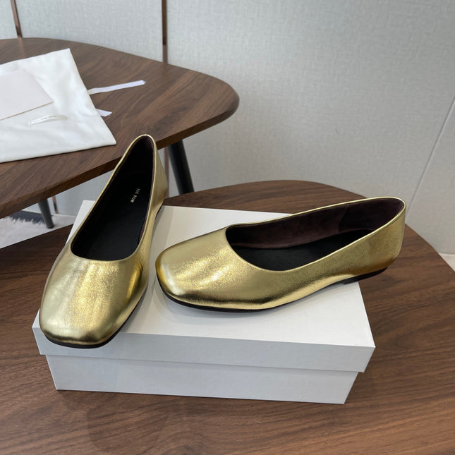 THE ROW 26S FLATS IN GOLD CALFSKIN