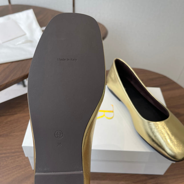 THE ROW 26S FLATS IN GOLD CALFSKIN