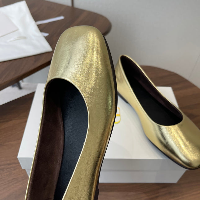 THE ROW 26S FLATS IN GOLD CALFSKIN