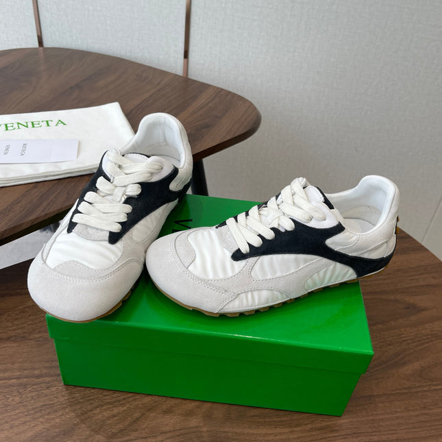 BOTTEGA VENETA 26S ORBIT FLASH SNEAKERS IN WHITE AND BLACK SUEDE