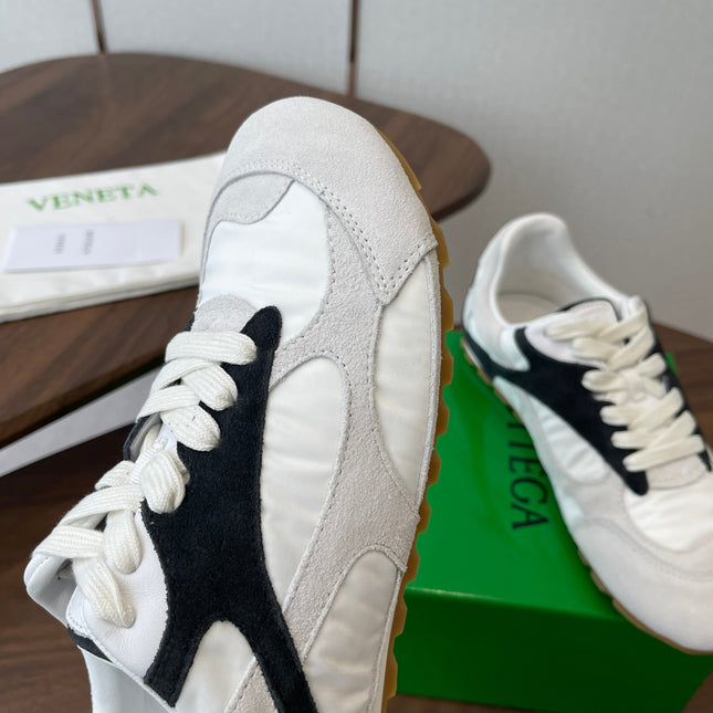 BOTTEGA VENETA 26S ORBIT FLASH SNEAKERS IN WHITE AND BLACK SUEDE