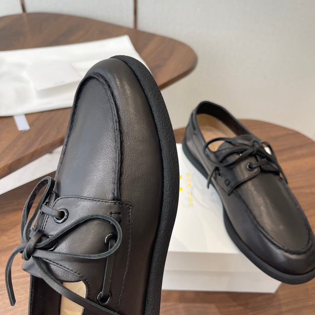 THE ROW 26S LOAFERS IN BLACK CALFSKIN