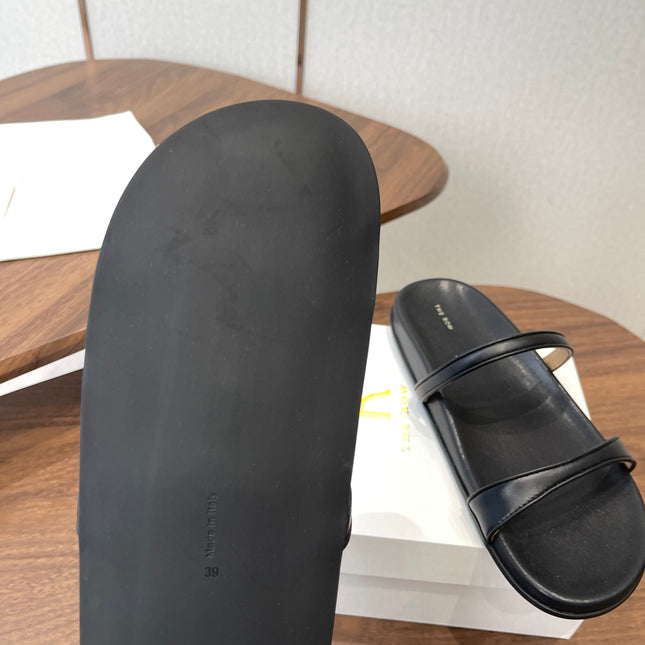 THE ROW 26S DOUBLE STRAP FLAT SANDALS IN BLACK CALFSKIN