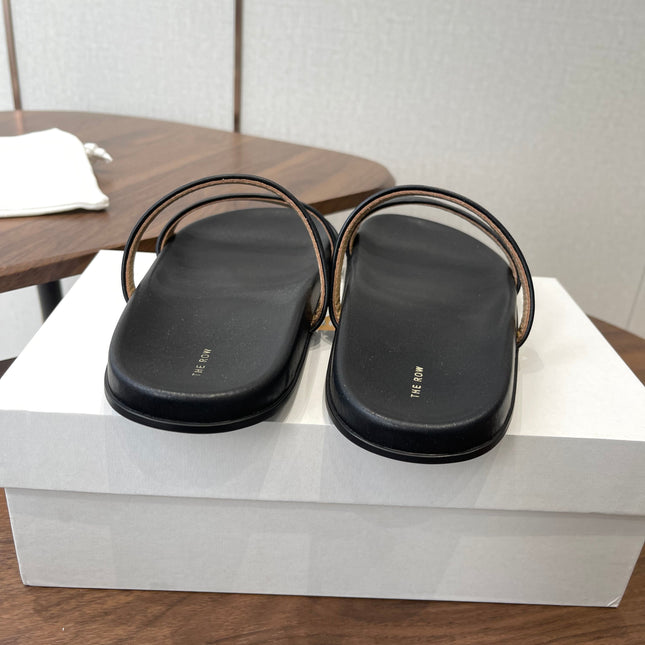 THE ROW 26S DOUBLE STRAP FLAT SANDALS IN BLACK CALFSKIN