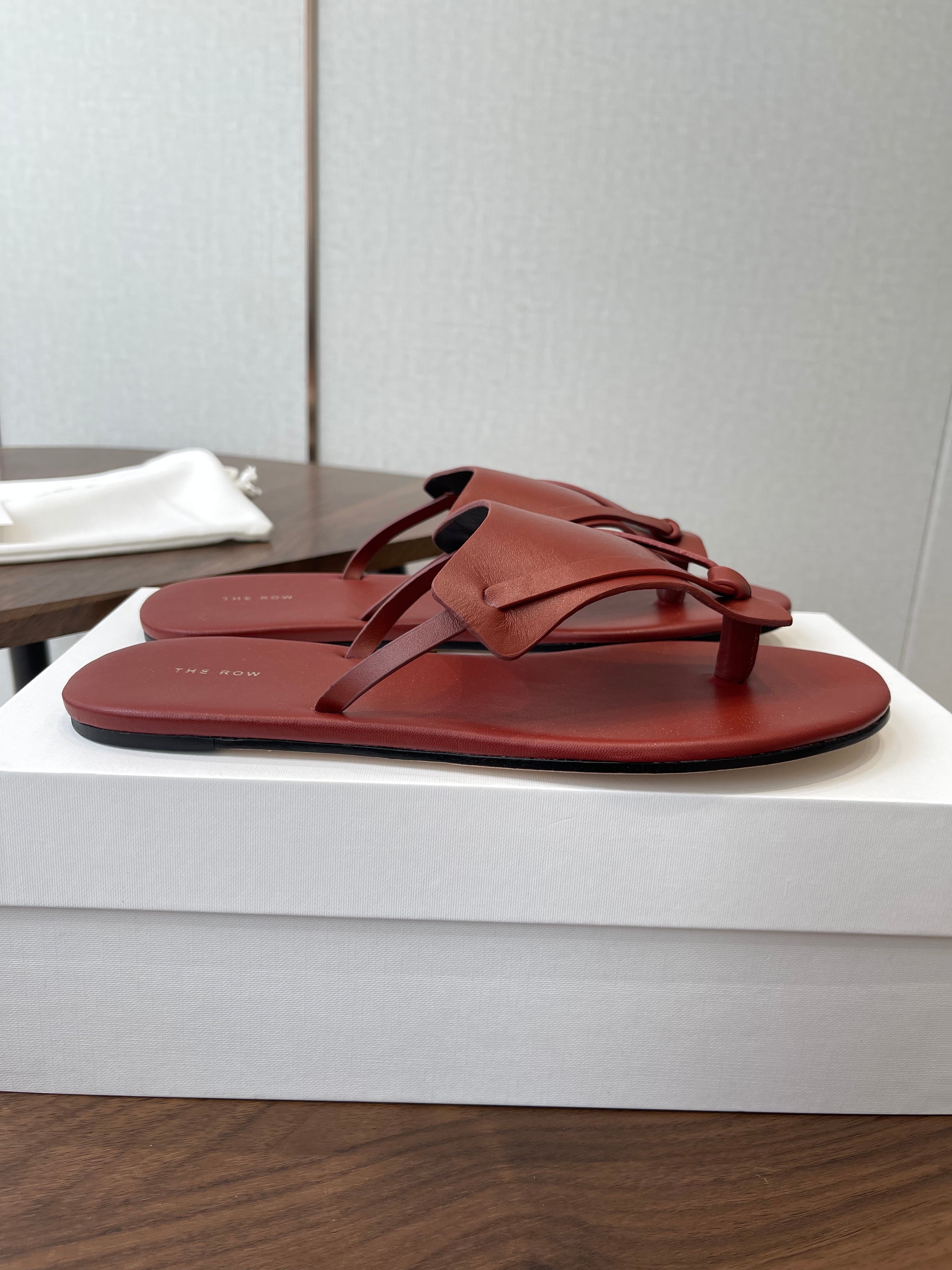 THE ROW 26S T STRAP THONG SANDALS IN RUST RED CALFSKIN