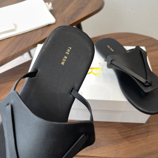 THE ROW 26S T STRAP THONG SANDALS IN BLACK CALFSKIN