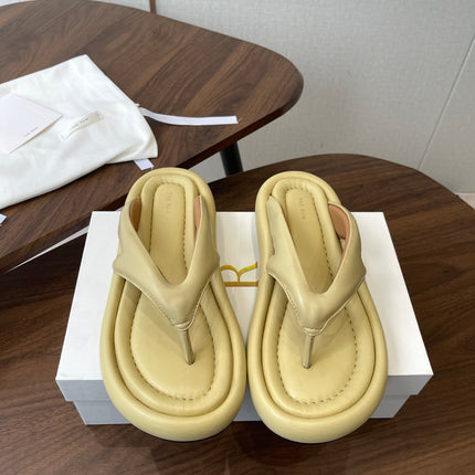 THE ROW 26S PUFFED THONG SANDALS IN BUTTER YELLOW CALFSKIN