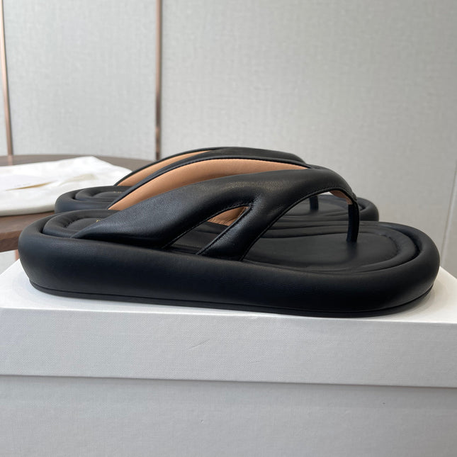 THE ROW 26S PUFFED THONG SANDALS IN BLACK CALFSKIN