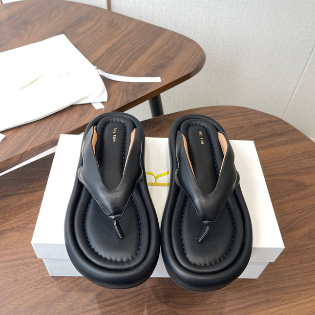 THE ROW 26S PUFFED THONG SANDALS IN BLACK CALFSKIN