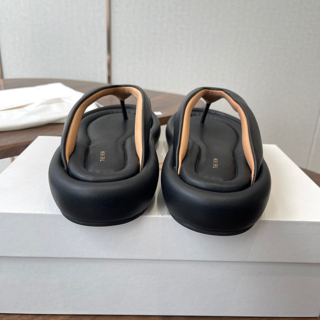 THE ROW 26S PUFFED THONG SANDALS IN BLACK CALFSKIN