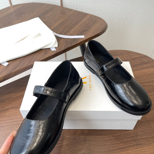 THE ROW 26S MARY JANE FLATS IN BLACK PATENT CALFSKIN