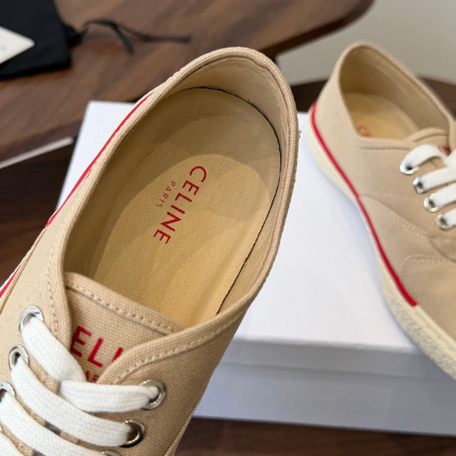 CELINE 26S TRIOMPHE LOW TOP SNEAKERS IN BEIGE CANVAS RED TRIM