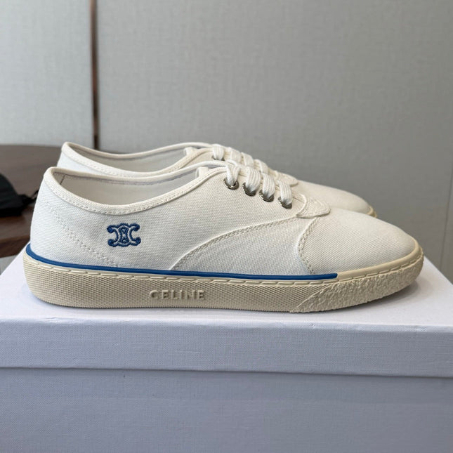 CELINE 26S TRIOMPHE LOW TOP SNEAKERS IN WHITE CANVAS BLUE TRIM