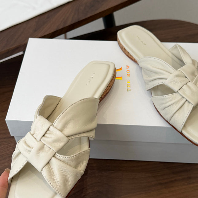 THE ROW 26S KNOT SLIDE SANDALS IN IVORY WHITE LAMBSKIN