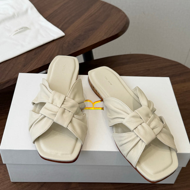 THE ROW 26S KNOT SLIDE SANDALS IN IVORY WHITE LAMBSKIN