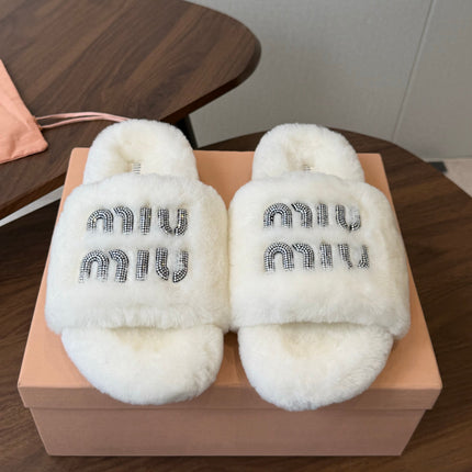 MIUMIU 26S CRYSTAL LOGO SLIDES IN WHITE SHEARLING