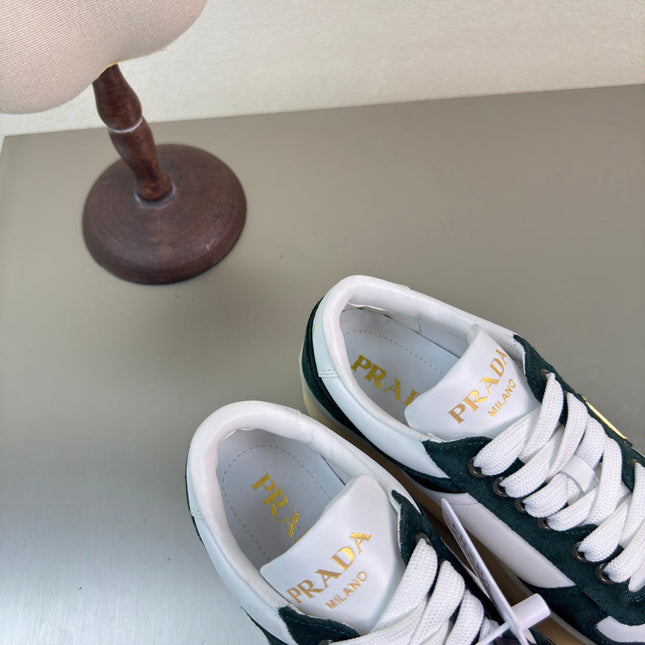 PRADA 26S DOWNTOWN THICK SOLE SNEAKERS IN WHITE CALFSKIN AND BLACK SUEDE