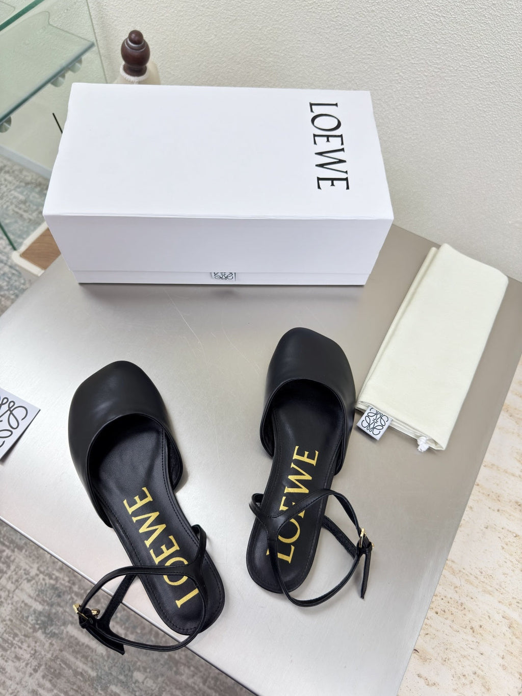 LOEWE 26S SLINGBACK FLAT PUMPS IN BLACK CALFSKIN