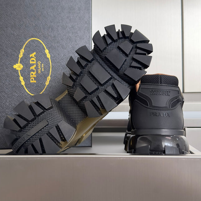 PRADA 26S CLOUDBUST THUNDER SNEAKERS 60MM IN BLACK AND GOLD MESH FABRIC AND TPU