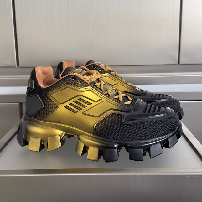 PRADA 26S CLOUDBUST THUNDER SNEAKERS 60MM IN BLACK AND GOLD MESH FABRIC AND TPU