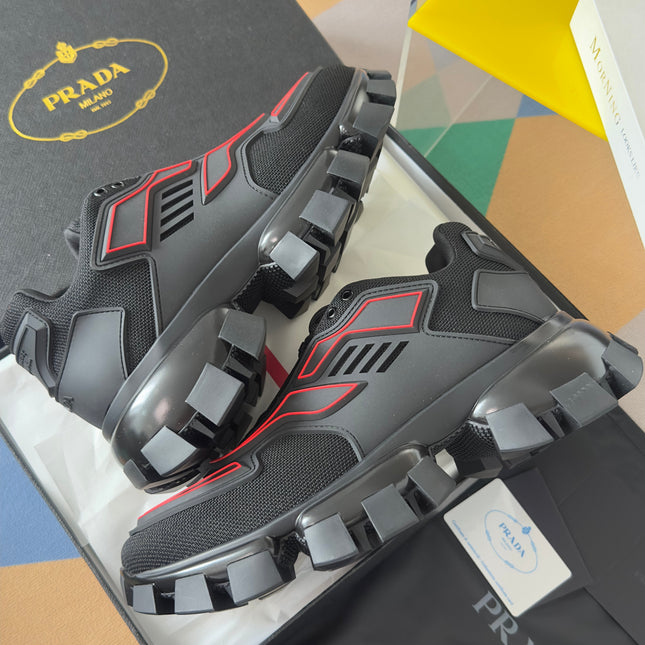 PRADA 26S CLOUDBUST THUNDER SNEAKERS 60MM IN BLACK AND RED MESH FABRIC AND TPU