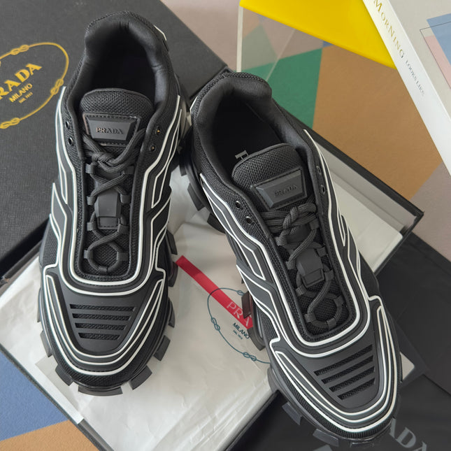 PRADA 26S CLOUDBUST THUNDER SNEAKERS 60MM IN BLACK AND WHITE MESH FABRIC AND TPU