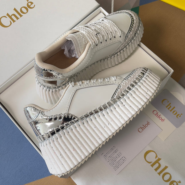 CHLOÉ 26S WEDGE SNEAKERS 70 MM IN WHITE AND SILVER CALFSKIN