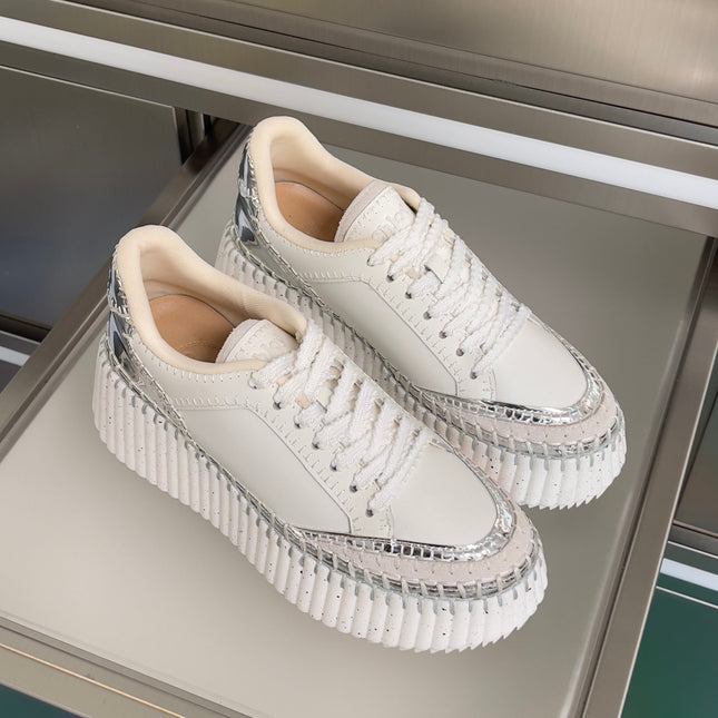 CHLOÉ 26S WEDGE SNEAKERS 70 MM IN WHITE AND SILVER CALFSKIN