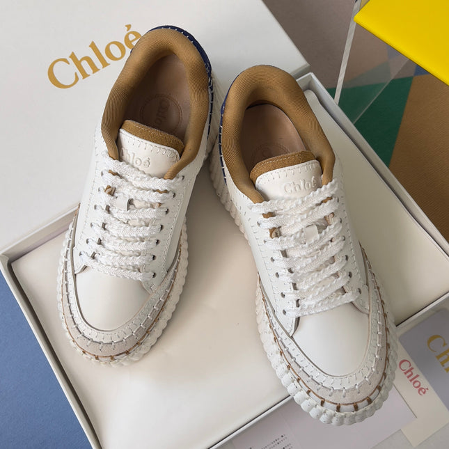 CHLOÉ 26S WEDGE SNEAKERS 70 MM IN WHITE CALFSKIN AND NAVY BLUE SUEDE