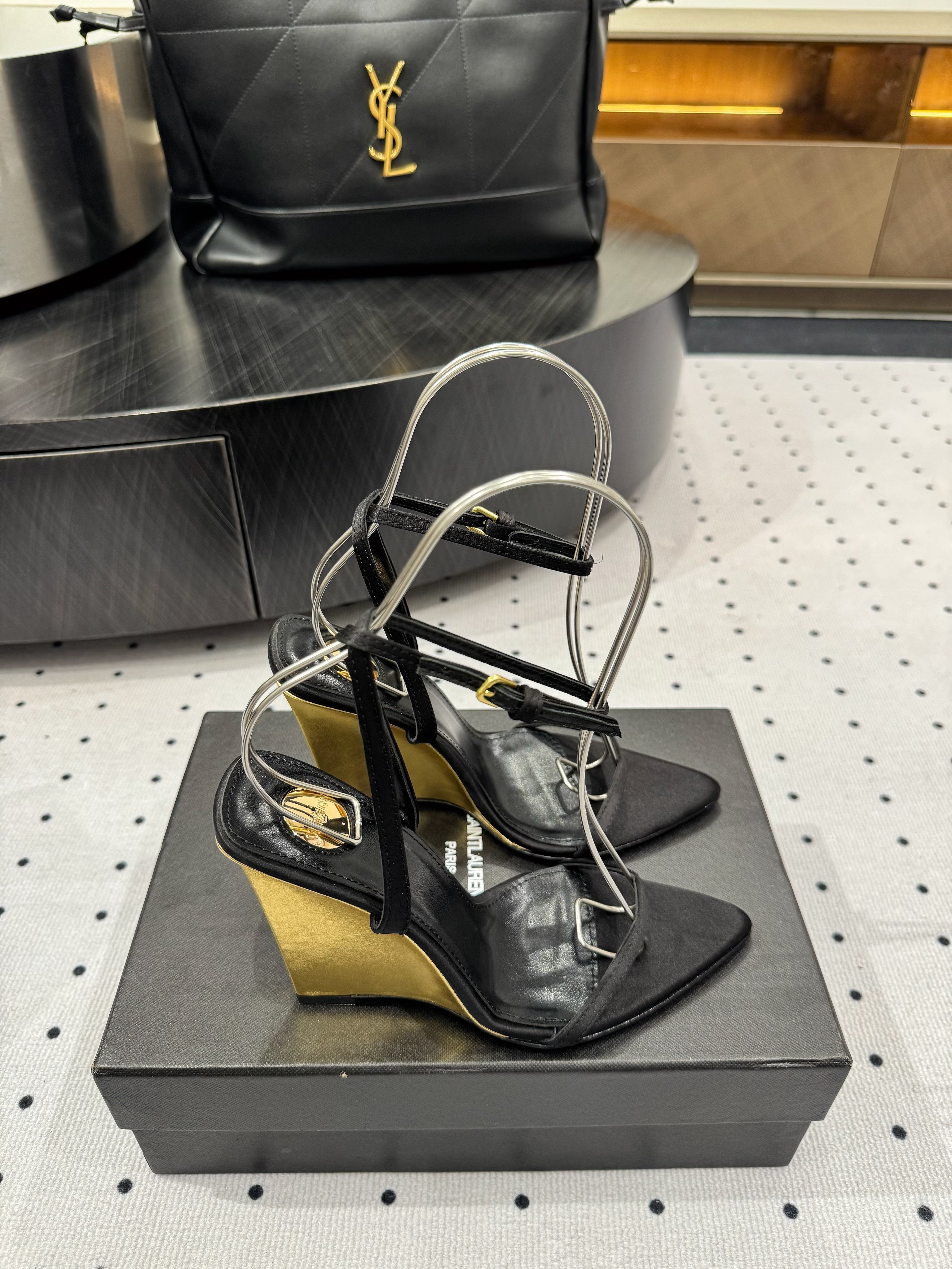 YSL 26S METAL-CAPPED WEDGE HEELS 105 MM IN BLACK SATIN
