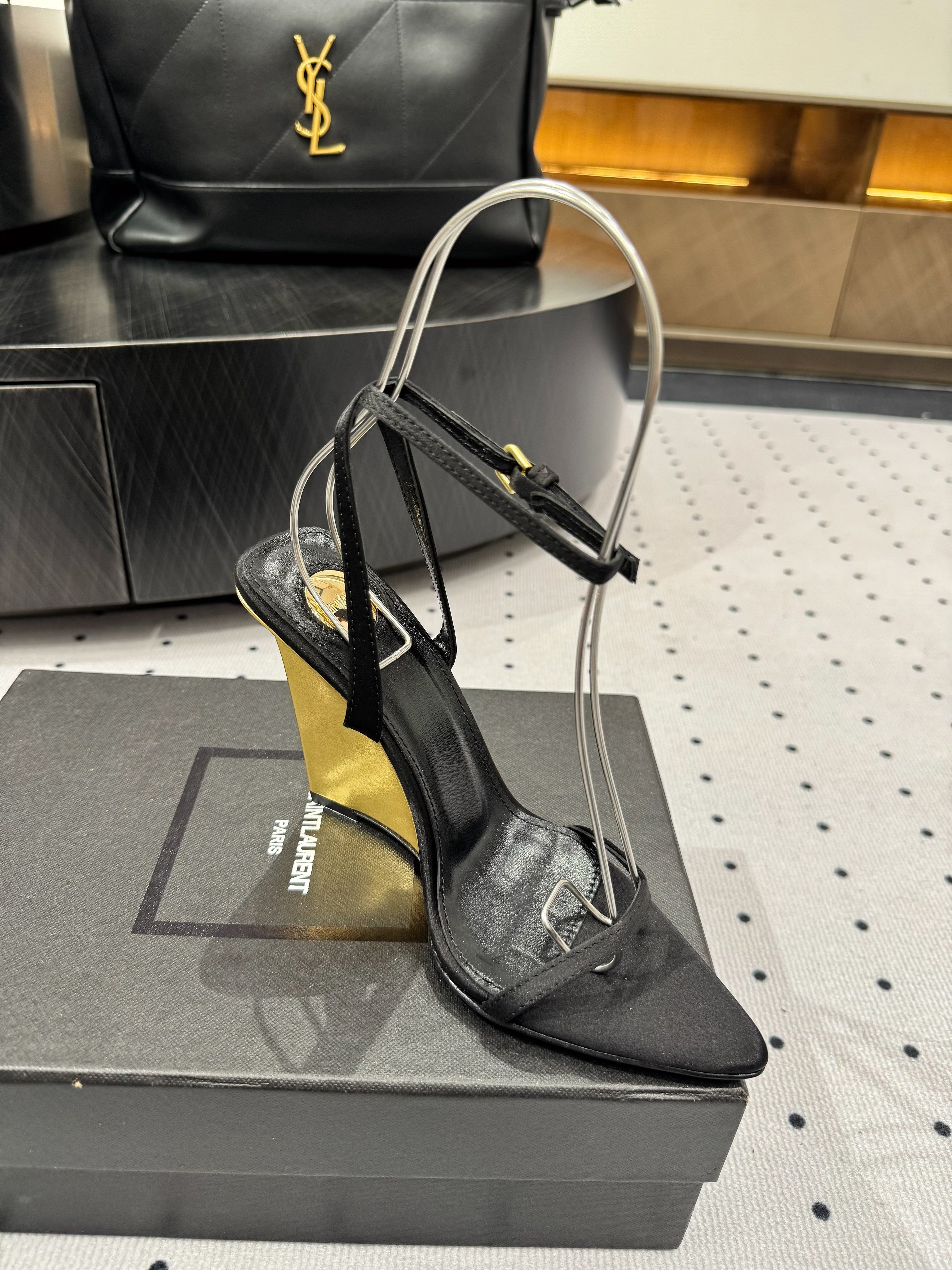 YSL 26S METAL-CAPPED WEDGE HEELS 105 MM IN BLACK SATIN