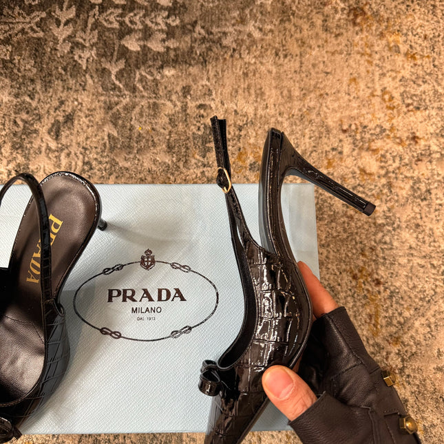 PRADA 25S SLINGBACK HIGH HEELS 75 MM IN BLACK EMBOSSED COWHIDE