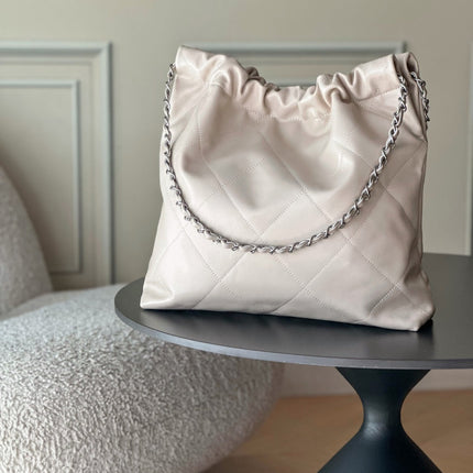 CHANEL 26S 22 BAG 42 IN LIGHT BEIGE QUILTED SHINY CALFSKIN