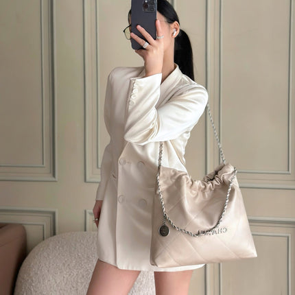 CHANEL 26S 22 BAG 42 IN LIGHT BEIGE QUILTED SHINY CALFSKIN