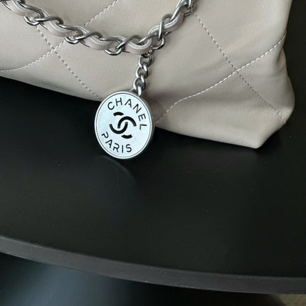 CHANEL 26S 22 BAG 42 IN LIGHT BEIGE QUILTED SHINY CALFSKIN