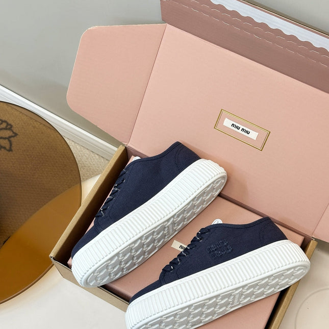 MIUMIU 26S PLATFORM SNEAKERS IN NAVY BLUE CANVAS