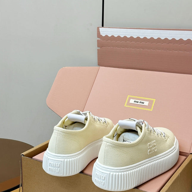 MIUMIU 26S PLATFORM SNEAKERS IN LIGHT YELLOW CANVAS