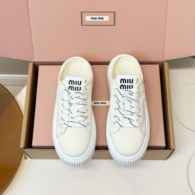 MIUMIU 26S SNEAKER MULES IN LIGHT YELLOW CANVAS