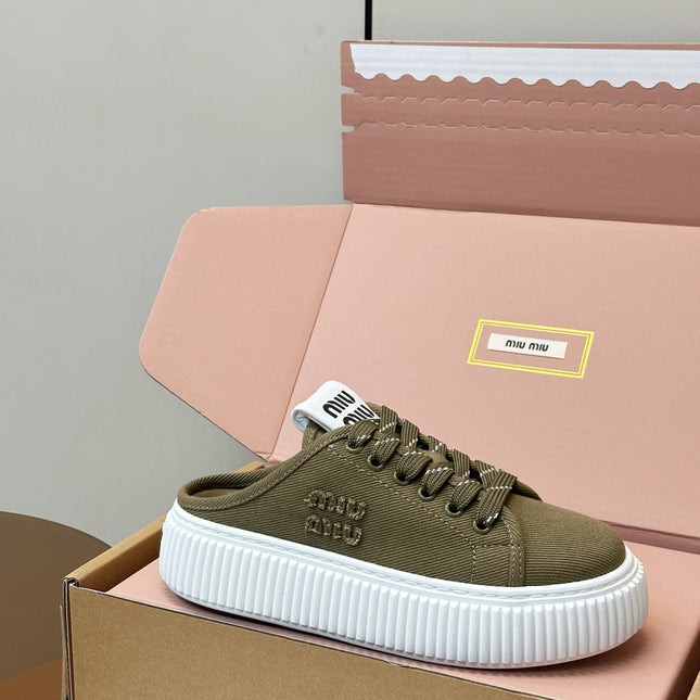 MIUMIU 26S SNEAKER MULES IN OLIVE GREEN CANVAS