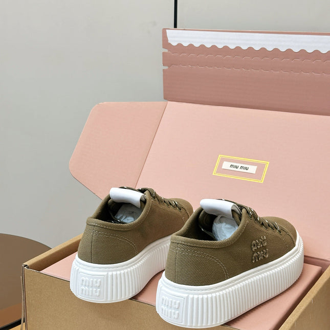 MIUMIU 26S PLATFORM SNEAKERS IN OLIVE GREEN CANVAS