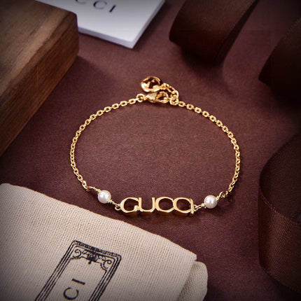 GUCCI 26S LETTER LOGO PEARL CHAIN BRACELET IN GOLD TONE METAL