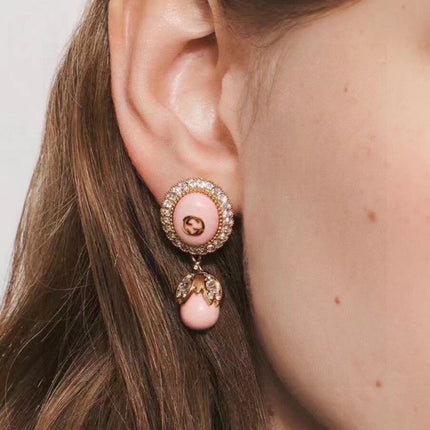 GUCCI 26S GG PINK ENAMEL HALO CRYSTAL DROP EARRINGS IN GOLD TONE METAL 624259
